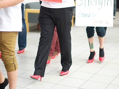 men walking in high heels